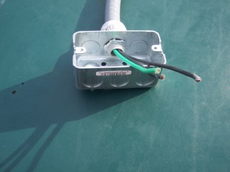 Electrical conduit attached to box